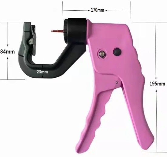 Automatic tag applicator Automatic tag applicator